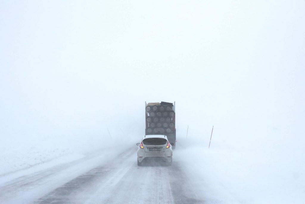 cars on a snowy highway